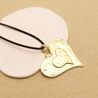 1 piece of matte golden vintage large pendant necklace featuring open heart