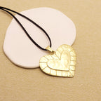 1 piece of matte golden vintage large pendant necklace featuring open heart