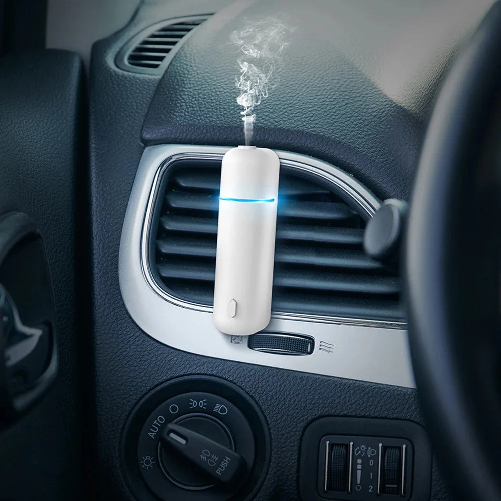Car Aroma Diffuser Mini USB Rechargeable Scent Machine Fragrance Oil Car Air Freshener Essential Oil Diffuser Vent Clip